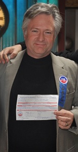 Kirk Harnack (KD5FYD) holds his temporary General Class Amateur license. Kirk Harnack (KD5FYD) holds his temporary General Class Amateur license.