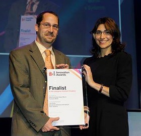 Cam Eicher accepts IBC Innovation Finalist Award
