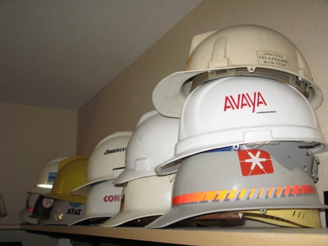 Hard hats from various phone installations