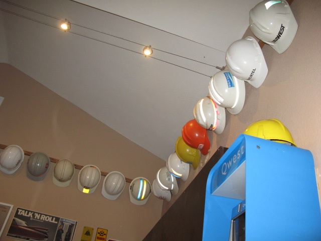 Hard hats hung neatly on the wall