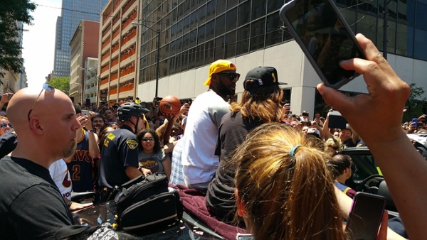 LeBron James' car travels through the throngs of adoring fans